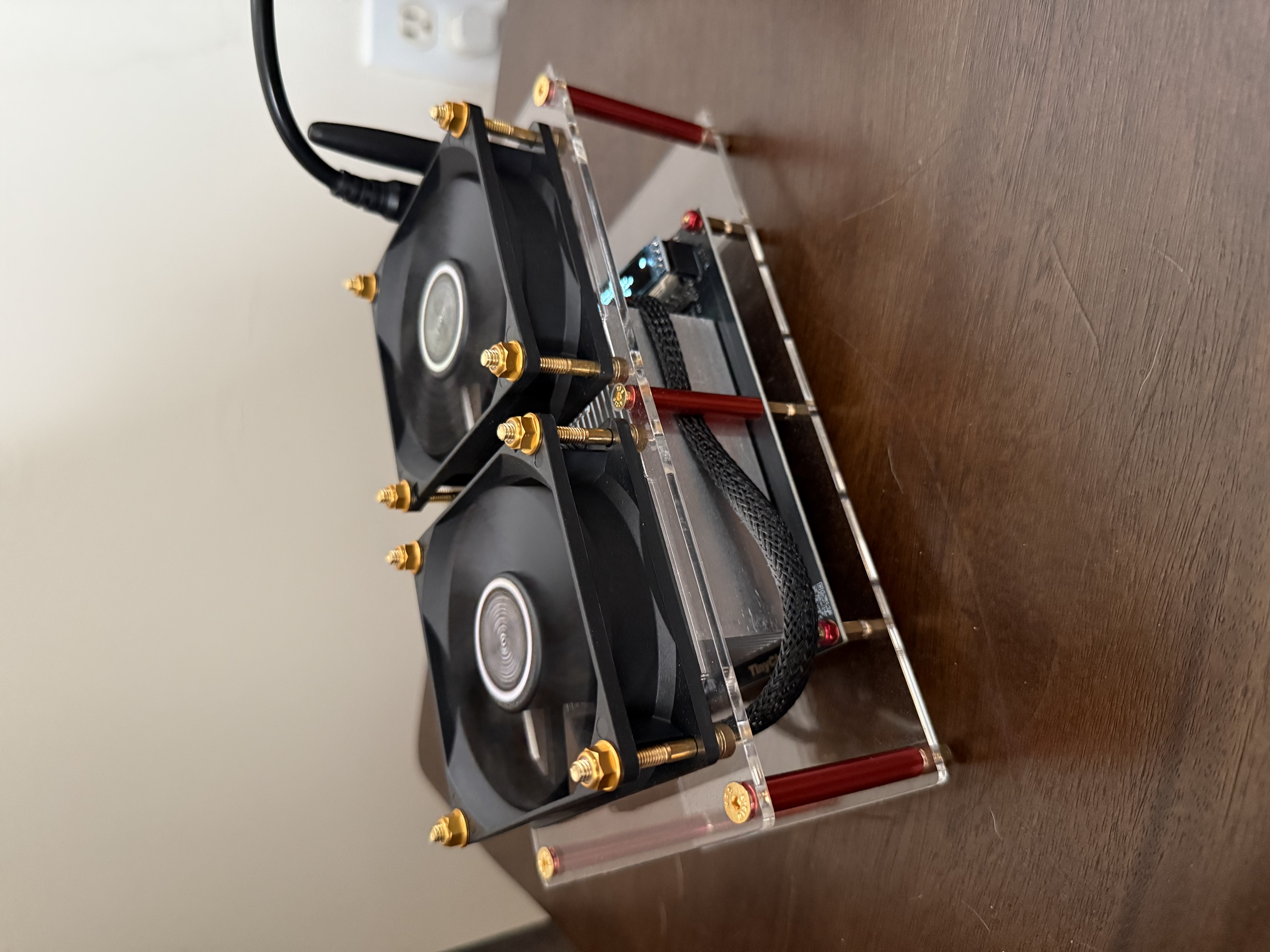 Bitaxe Hex running on Mike's desk alongside other home mining gear.